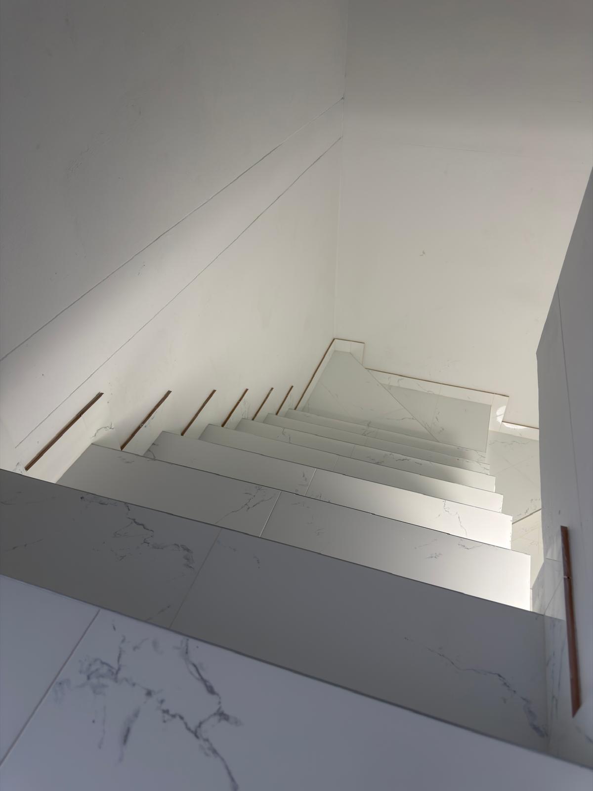 Escalier carrelé réalisé par VUCERA